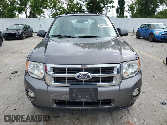 2012 Ford Escape XLT с VIN 1FMCU9DG7CKC03954, выставлен на аукционе Copart как лот 61026785 с пробегом 181 091 миль миль и Списание • Salvage title. История ставок и продаж доступна на DreamBid. Изображение 5.