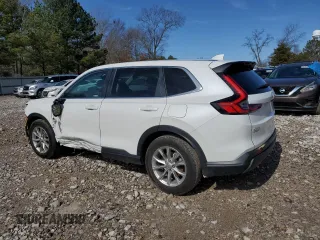 2024 Honda CR-V EX-L with VIN 2HKRS3H75RH335002, listed as a Copart auction lot 43142945 with 11,591 mi miles and Salvage Title. Bid and sale history available at DreamBid. Image 2.