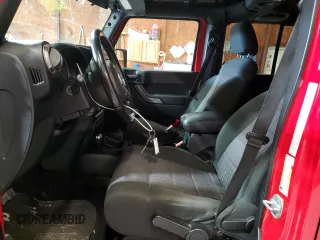 2012 Jeep Wrangler Unlimited Sport z VIN 1C4HJWDG2CL117124, wystawiony jako Copart lot #57288435 z przebiegiem 134 860 mil mil oraz Czysty tytuł • Clean title. Historia ofert i sprzedaży dostępna na DreamBid. Obrazek 7.