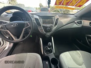 2012 Hyundai Veloster w/Gray Int с VIN KMHTC6AD6CU036826, выставлен на аукционе Copart как лот 48781135 с пробегом 169 498 миль миль и Чистый • Clean title. История ставок и продаж доступна на DreamBid. Изображение 9.