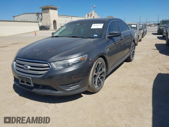 2015 Ford Taurus SEL with VIN 1FAHP2E84FG177553, listed as a IAAI auction lot 41753755 with 153,252 mi miles and . Bid and sale history available at carsss.com. Image 2.