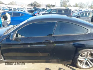 2014 BMW 4 Series 428i with VIN WBA3N7C55EK221259, listed as a IAAI auction lot 41322781 with 100,274 mi miles and . Bid and sale history available at carsss.com. Image 14.