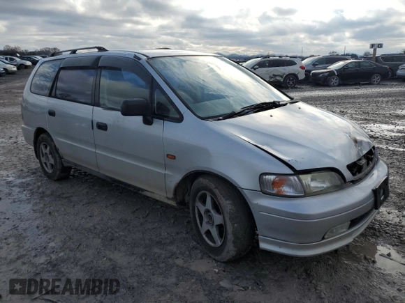 1995 Honda Odyssey with VIN RA21049652, listed as a Copart auction lot 85426404 with 271,632 mi miles and Clean title. Bid and sale history available at DreamBid. Image 4.