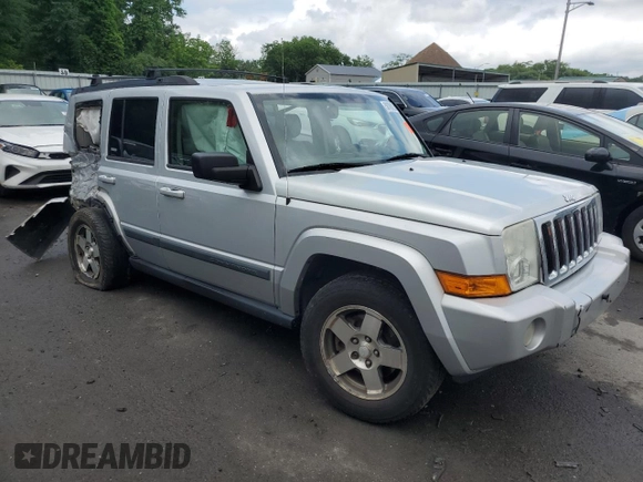2009 Jeep Commander Sport z VIN 1J8HG48K29C531877, wystawiony jako Copart lot #58708825 z przebiegiem 198 585 mil mil oraz Szkoda całkowita • Salvage title. Historia ofert i sprzedaży dostępna na DreamBid. Obrazek 4.