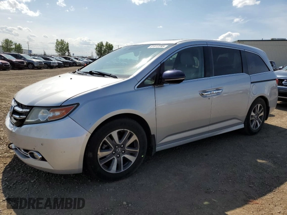2014 Honda Odyssey Touring with VIN 5FNRL5H91EB502555, listed as a Copart auction lot 61872285 with 203,448 mi miles and Salvage title. Bid and sale history available at DreamBid. Image 1.