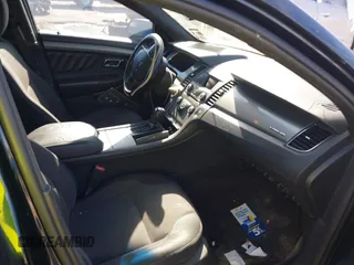 2014 Ford Taurus SEL z VIN 1FAHP2E84EG170133, wystawiony jako IAAI lot #41045369 z przebiegiem 261 732 mil mil oraz . Historia ofert i sprzedaży dostępna na DreamBid. Obrazek 5.