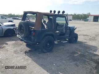 1997 Jeep Wrangler Sport with VIN 1J4FY19S5VP539283, listed as a IAAI auction lot 41996476 with 131,593 mi miles and . Bid and sale history available at DreamBid. Image 4.