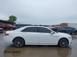2017 Lincoln Continental Select z VIN 1LN6L9SK5H5616680, wystawiony jako IAAI lot #42465865 z przebiegiem 86 686 mil mil oraz . Historia ofert i sprzedaży dostępna na DreamBid. Obrazek 13.