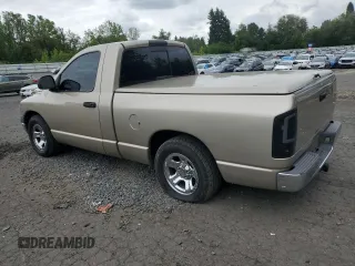 2002 Dodge 1500 with VIN 1D7HA16K52J232739, listed as a Copart auction lot 73134014 with 143,950 mi miles and Salvage Title. Bid and sale history available at DreamBid. Image 2.