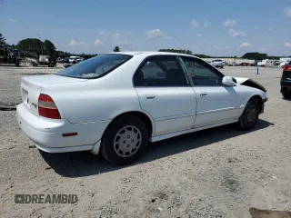 1994 Honda Accord с VIN 1HGCD5642RA166652, выставлен на аукционе Copart как лот 57225365 с пробегом 247 643 миль миль и Списание • Salvage title. История ставок и продаж доступна на DreamBid. Изображение 3.
