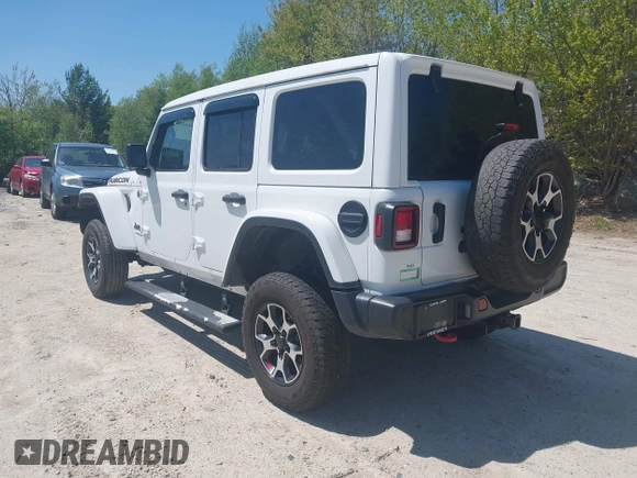 2021 Jeep Wrangler Unlimited Rubicon with VIN 1C4HJXFG5MW586842, listed as a IAAI auction lot 42186683 with 76,450 mi miles and . Bid and sale history available at DreamBid. Image 3.