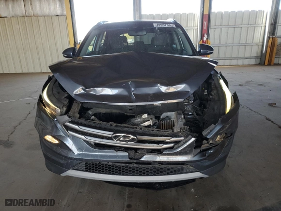2018 Hyundai Tucson Value with VIN KM8J33A23JU823248, listed as a Copart auction lot 42967005 with 107,295 mi miles and Salvage Title. Bid and sale history available at carsss.com. Image 5.