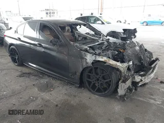 2021 BMW 5 Series M550i xDrive with VIN WBA13BK05MCF84792, listed as a IAAI auction lot 42078945 with Not provided miles and . Bid and sale history available at DreamBid. Image 1.