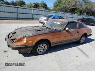1982 Datsun 280ZX 2+2 z VIN JN1HZ06S8CX428785, wystawiony jako Copart lot #80942274 z przebiegiem 88 574 mil mil oraz Tytuł czysty. Historia ofert i sprzedaży dostępna na DreamBid. Obrazek 1.