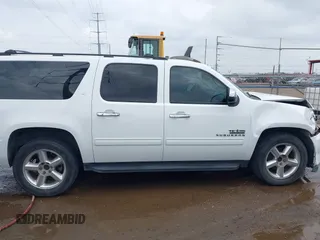 2014 Chevrolet Suburban LT with VIN 1GNSCJE04ER107836, listed as a IAAI auction lot 41698679 with 106,139 mi miles. Bid and sale history available at carsss.com. Image 13.