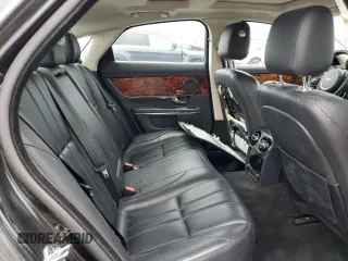 2013 Jaguar XJ с VIN SAJWJ1CD8D8V52463, выставлен на аукционе Copart как лот 61772115 с пробегом 123 899 миль миль и Чистый • Clean title. История ставок и продаж доступна на DreamBid. Изображение 10.