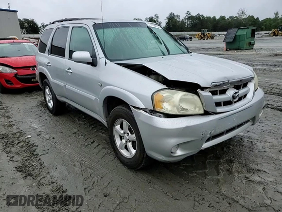 2006 Mazda Tribute i with VIN 4F2YZ02Z26KM14821, listed as a Copart auction lot 71718434 with 318,841 mi miles and Salvage Title. Bid and sale history available at carsss.com. Image 10.