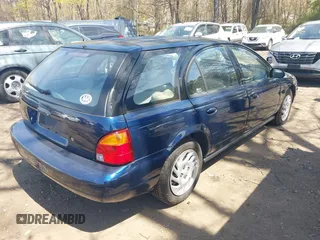 1999 Saturn SW z VIN 1G8ZK8274XZ254806, wystawiony jako IAAI lot #42105064 z przebiegiem 20 186 mil mil oraz . Historia ofert i sprzedaży dostępna na DreamBid. Obrazek 4.
