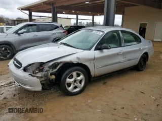 2000 Ford Taurus SE with VIN 1FAFP532XYA141783, listed as a Copart auction lot 43949795 with 203,939 mi miles and Salvage Title. Bid and sale history available at DreamBid. Image 1.