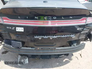 2020 Lincoln MKZ Hybrid Premiere with VIN 3LN6L5KU6LR614453, listed as a IAAI auction lot 42440643 with 76,384 mi miles and . Bid and sale history available at DreamBid. Image 6.