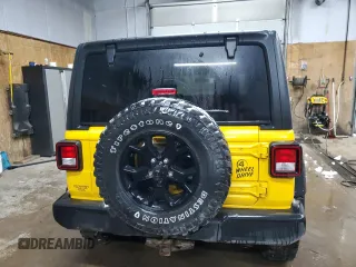 2020 Jeep Wrangler Unlimited Sport Altitude with VIN 1C4HJXDG4LW284590, listed as a Copart auction lot 84806434 with 88,887 mi miles and Salvage title. Bid and sale history available at DreamBid. Image 6.
