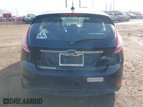 2014 Ford Fiesta Titanium z VIN 3FADP4FJXEM127644, wystawiony jako IAAI lot #41555040 z przebiegiem 107 046 mil mil oraz . Historia ofert i sprzedaży dostępna na DreamBid. Obrazek 17.