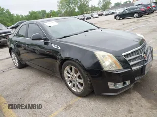 2009 Cadillac CTS AWD w/1SB with VIN 1G6DT57V290165006, listed as a IAAI auction lot 42144947 with 162,969 mi miles. Bid and sale history available at carsss.com. Image 1.