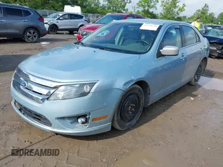 2011 Ford Fusion Hybrid z VIN 3FADP0L30BR123857, wystawiony jako IAAI lot #42534556 z przebiegiem 144 811 mil mil oraz . Historia ofert i sprzedaży dostępna na DreamBid. Obrazek 2.