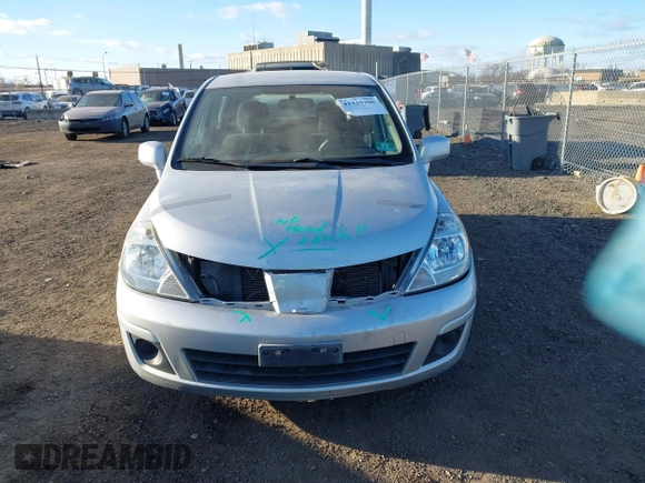 2012 Nissan Versa S with VIN 3N1BC1CP2CK213563, listed as a IAAI auction lot 41339306 with 61,581 mi miles. Bid and sale history available at carsss.com. Image 12.