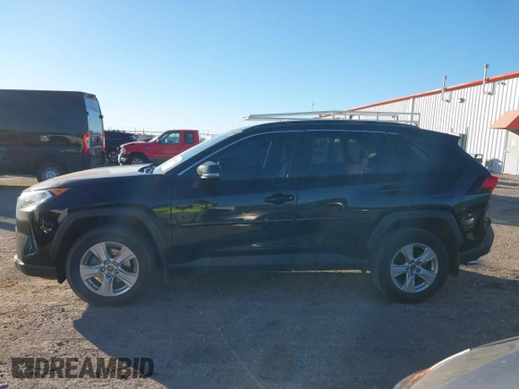 2019 Toyota RAV4 XLE with VIN JTMW1RFV1KD002799, listed as a IAAI auction lot 40887562 with 75,016 mi miles. Bid and sale history available at carsss.com. Image 14.