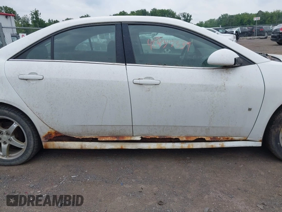 2009 Pontiac G6 1SB with VIN 1G2ZJ57K294240301, listed as a IAAI auction lot 42437339 with 138,984 mi miles and . Bid and sale history available at DreamBid. Image 6.