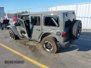 2020 Jeep Wrangler Unlimited Rubicon with VIN 1C4HJXFN4LW136516, listed as a IAAI auction lot 41874403 with 87,576 mi miles. Bid and sale history available at carsss.com. Image 3.