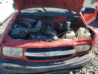 1999 Chevrolet Tracker z VIN 2CNBE1862X6931542, wystawiony jako Copart lot #72216254 z przebiegiem 179 527 mil mil oraz Szkoda całkowita • Salvage title. Historia ofert i sprzedaży dostępna na DreamBid. Obrazek 12.