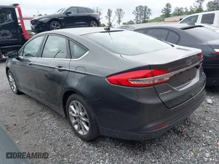 2017 Ford Fusion SE with VIN 3FA6P0H78HR317064, listed as a IAAI auction lot 42101884 with 133,042 mi miles. Bid and sale history available at carsss.com. Image 3.