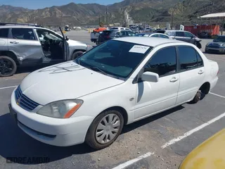 2006 Mitsubishi Lancer ES with VIN JA3AJ26E56U012676, listed as a IAAI auction lot 41857476 with 1 mi miles. Bid and sale history available at carsss.com. Image 13.