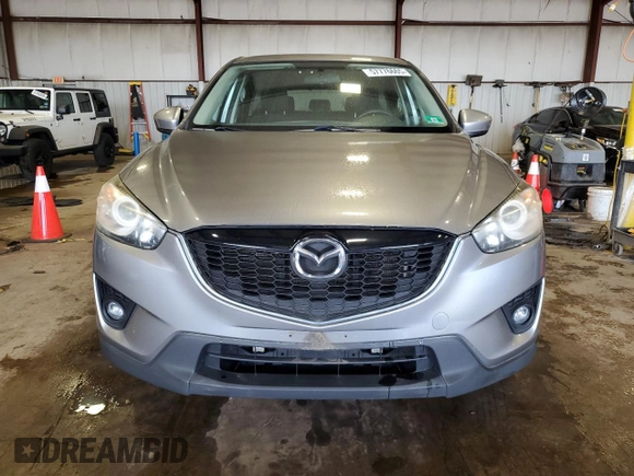 2014 Mazda CX-5 Touring z VIN JM3KE4CY5E0393463, wystawiony jako Copart lot #57776665 z przebiegiem 91 565 mil mil oraz Szkoda całkowita • Salvage title. Historia ofert i sprzedaży dostępna na DreamBid. Obrazek 5.