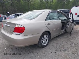 2005 Toyota Camry LE with VIN 4T1BF32K05U093461, listed as a IAAI auction lot 41947197 with 127,630 mi miles and . Bid and sale history available at DreamBid. Image 4.