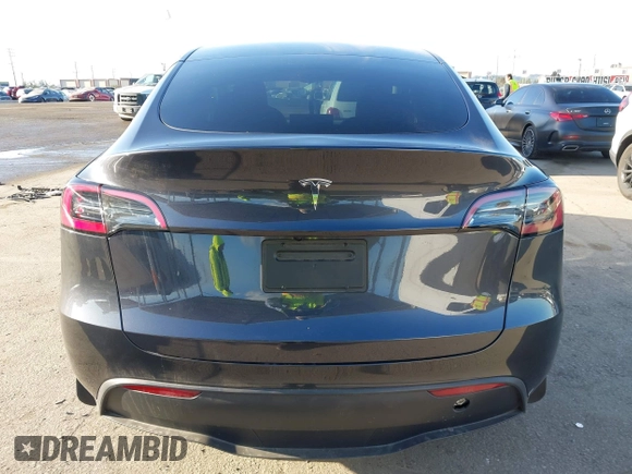 2024 Tesla Model Y with VIN 7SAYGDED5RF103983, listed as a IAAI auction lot 41933836 with 11,398 mi miles and . Bid and sale history available at DreamBid. Image 16.