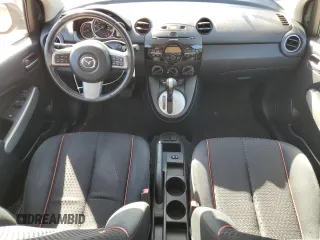 2014 Mazda 2 Touring z VIN JM1DE1LYXE0174854, wystawiony jako Copart lot #56712225 z przebiegiem 163 065 mil mil oraz Szkoda całkowita • Salvage title. Historia ofert i sprzedaży dostępna na DreamBid. Obrazek 8.