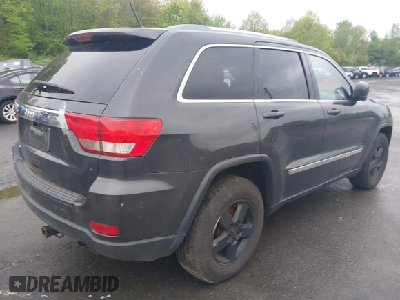 2011 Jeep Grand Cherokee Laredo with VIN 1J4RR4GGXBC604304, listed as a IAAI auction lot 42201742 with 196,483 mi miles and . Bid and sale history available at DreamBid. Image 4.