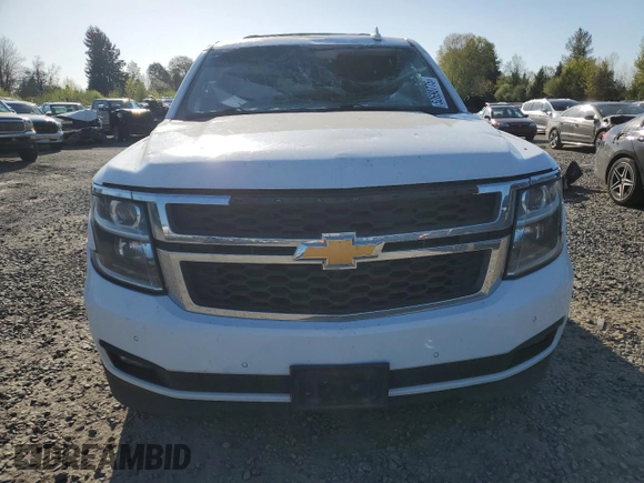 2020 Chevrolet Tahoe LT z VIN 1GNSKBKC5LR243378, wystawiony jako Copart lot #52690775 z przebiegiem 79 900 mil mil oraz Szkoda całkowita • Salvage title. Historia ofert i sprzedaży dostępna na DreamBid. Obrazek 5.