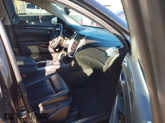 2014 Cadillac SRX with VIN 3GYFNAE32ES550136, listed as a IAAI auction lot 41219755 with 161,878 mi miles and . Bid and sale history available at DreamBid. Image 5.