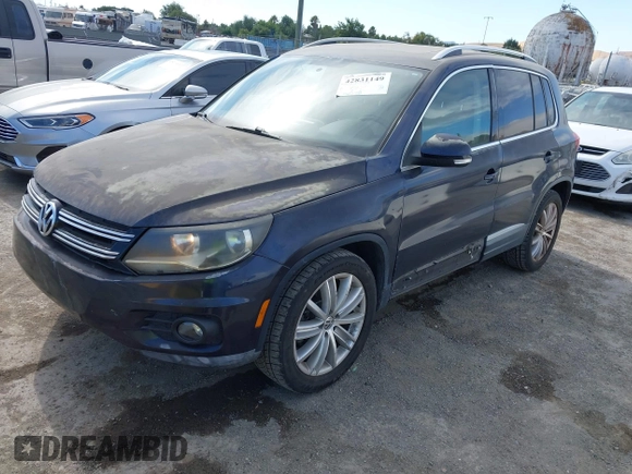 2012 Volkswagen Tiguan S with VIN WVGAV7AX9CW546724, listed as a IAAI auction lot 42831149 with 103,528 mi miles and . Bid and sale history available at DreamBid. Image 2.