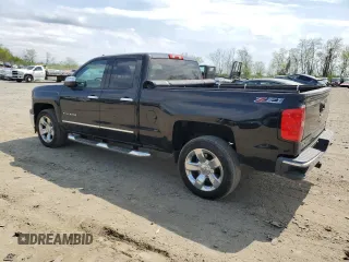 2014 Chevrolet Silverado 1500 LTZ with VIN 1GCVKSEC3EZ269921, listed as a Copart auction lot 51528565 with 137,218 mi miles and Salvage Title. Bid and sale history available at DreamBid. Image 2.