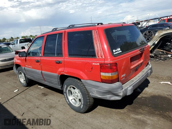 1996 Jeep Grand Cherokee Laredo with VIN 1J4GZ58S0TC170623, listed as a Copart auction lot 68019014 with 174,192 mi miles and Salvage Title. Bid and sale history available at carsss.com. Image 2.
