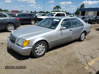 1994 Mercedes-Benz S with VIN WDBGA43EXRA182452, listed as a Copart auction lot 63147335 with 185,657 mi miles and Salvage title. Bid and sale history available at DreamBid. Image 1.