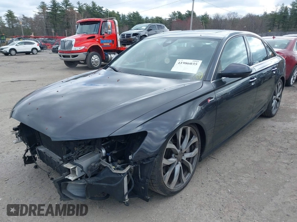 2013 Audi A6 Prestige with VIN WAUHGAFC9DN059480, listed as a IAAI auction lot 41986035 with 142,511 mi miles and . Bid and sale history available at DreamBid. Image 2.