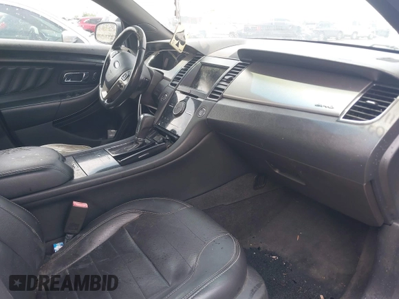 2013 Ford Taurus SHO с VIN 1FAHP2KT9DG144215, выставлен на аукционе IAAI как лот 42107386 с пробегом 199 934 миль миль и . История ставок и продаж доступна на DreamBid. Изображение 5.
