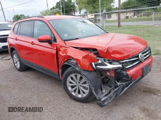 2019 Volkswagen Tiguan S z VIN 3VV0B7AXXKM189661, wystawiony jako IAAI lot #41968374 z przebiegiem 76 117 mil mil oraz . Historia ofert i sprzedaży dostępna na DreamBid. Obrazek 1.
