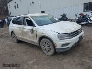 2021 Volkswagen Tiguan SE with VIN 3VV2B7AX4MM009456, listed as a IAAI auction lot 41876861 with 72,203 mi miles. Bid and sale history available at carsss.com. Image 1.